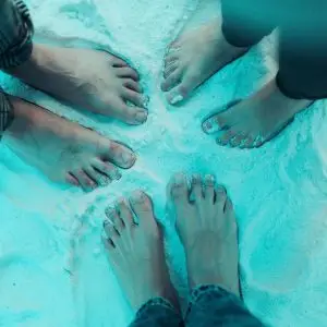 feet in the sand